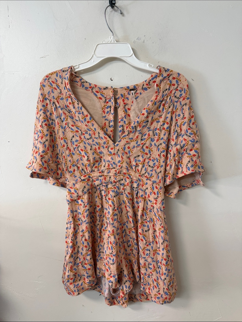 Free People Peach Floral Romper with Blue & Red Accents